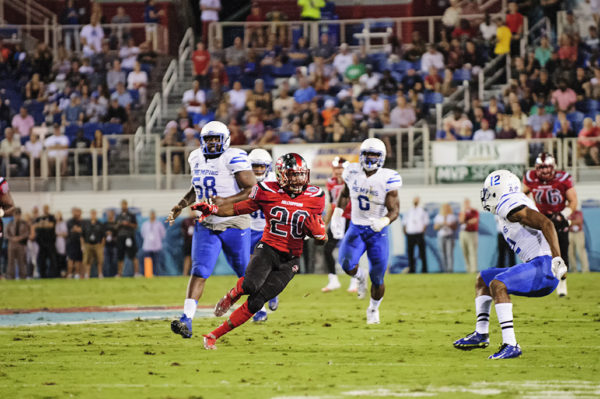 Anthony Wales, Western Kentucky RB, makes a cut upfield
