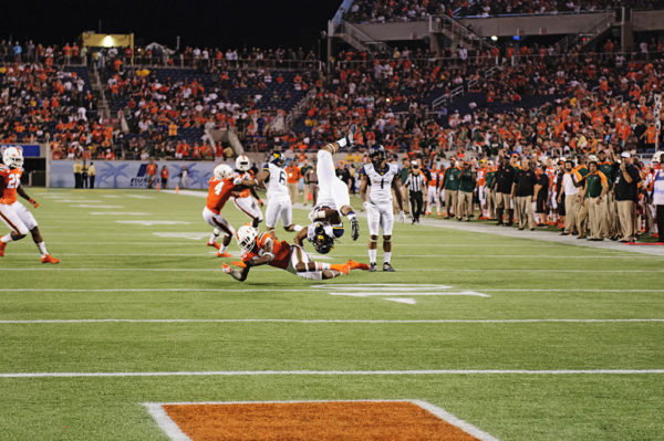 Adrian Colbert flips the receiver in mid air