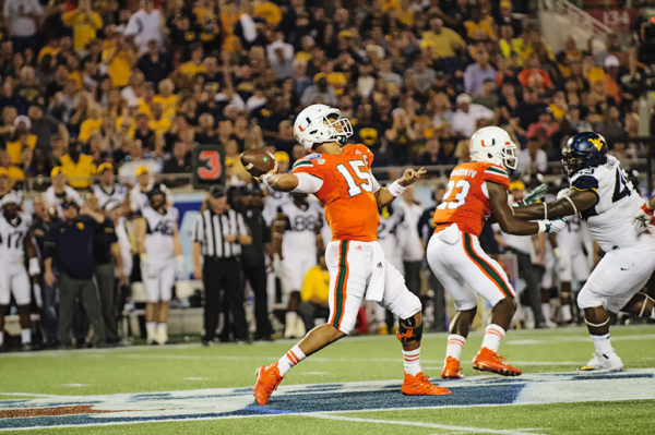 Miami Hurricanes QB, Brad Kaaya, launches a pass deep downfield