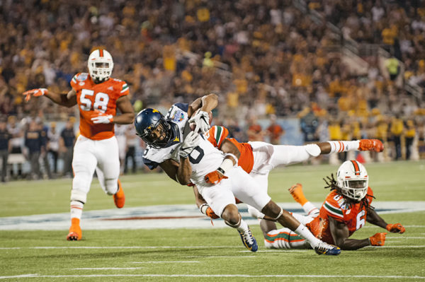 West Virginia WR, Daikiel Shorts, gets tackled