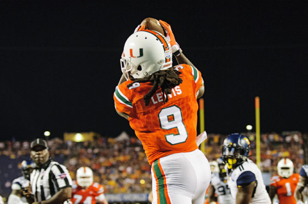 Malcom Lewis, Miami Hurricanes WR, catches a touchdown pass