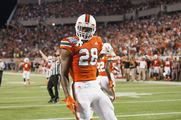 Michael Jackson, Hurricanes DB, celebrates a 3rd down stop on defense