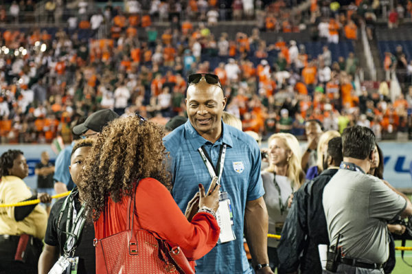 Former NFL great, Eddie George, is on hand for the trophy presentation