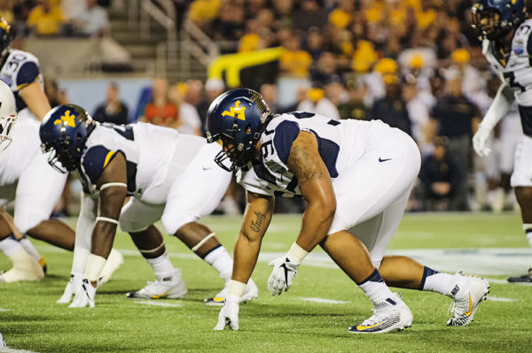 Noble Nwachukwu, West Virginia DL, lines up on defense
