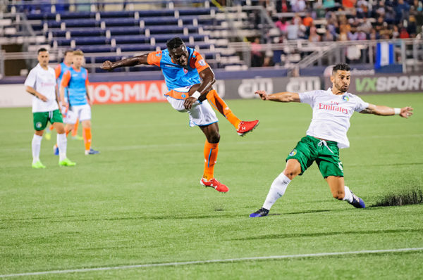 Miami FC midfielder, Kwadwo Poku, attempts a shot