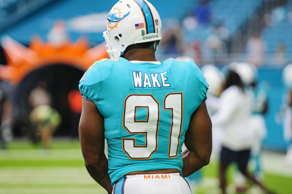Cameron Wake, #91, gets ready to line up for drills