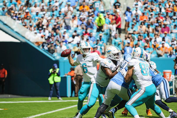 Dolphins QB, Jay Cutler, looks to throw a pass