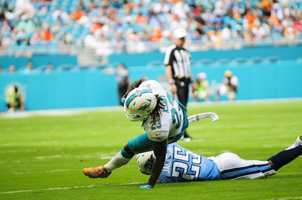 Jay Ajayi gets tripped up by Adoree Jackson