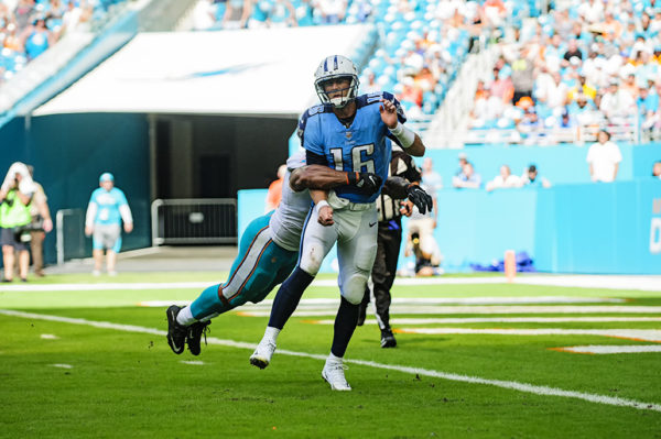 Cameron Wake hits Matt Cassel after he makes a throw