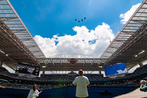 Fighter jets perform a flyover during the national anthem