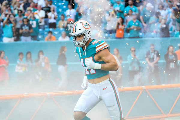 Miami Dolphins outside linebacker Kiko Alonso (47) runs out through the smoke