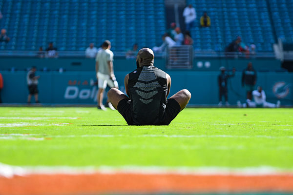 Jacksonville Jaguars running back Leonard Fournette (27) stretching