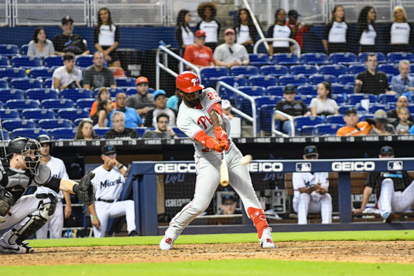 Philadelphia Phillies center fielder Andrew McCutchen (22) hits a triple in the 14th inning
